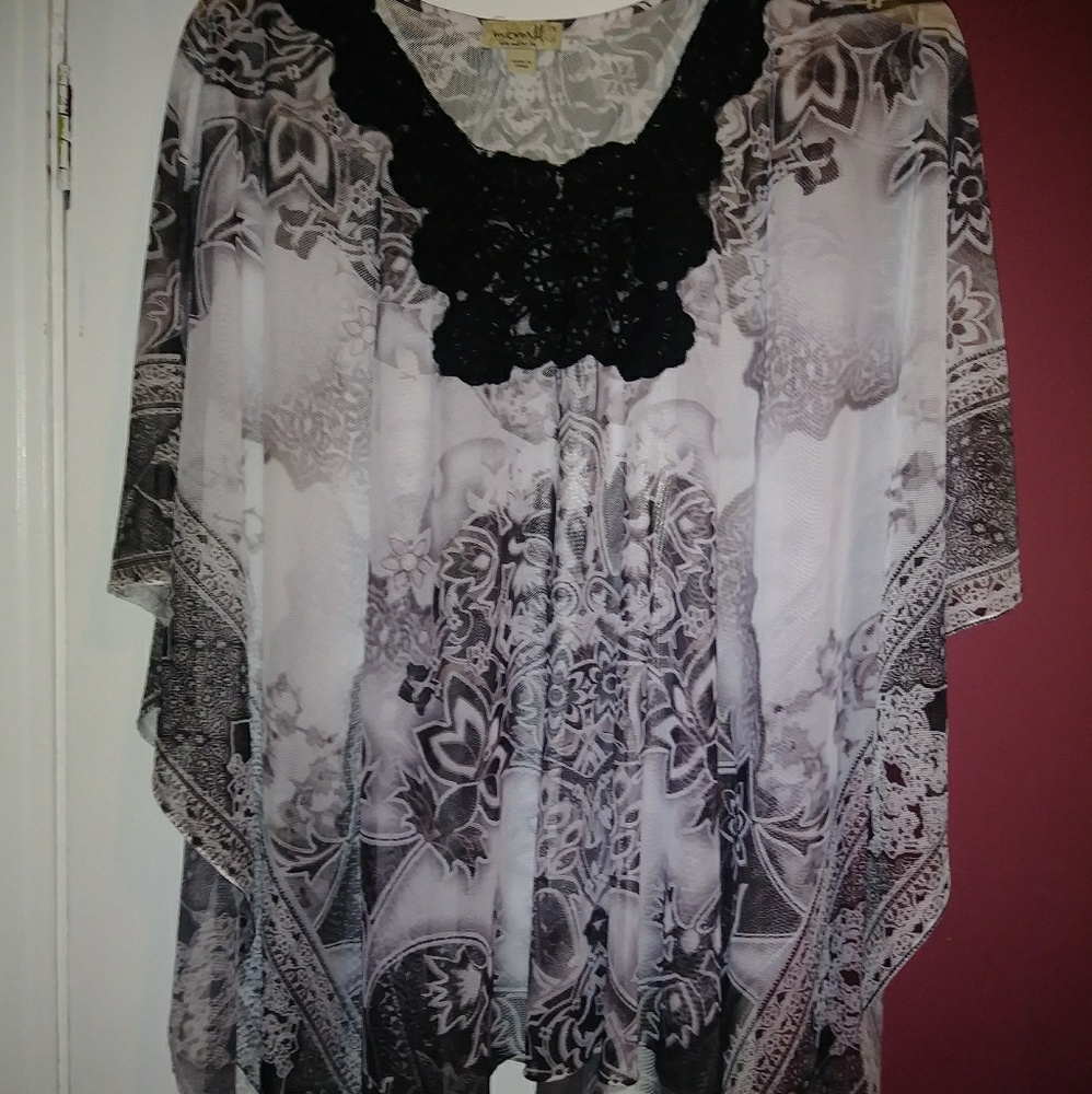 Black and white sheer puncho style top